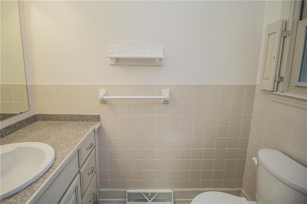 772 Bescher Chapel Road Trinity, NC 27370 - Photo 17 of 29 Updated custom-height countertop, new toilet