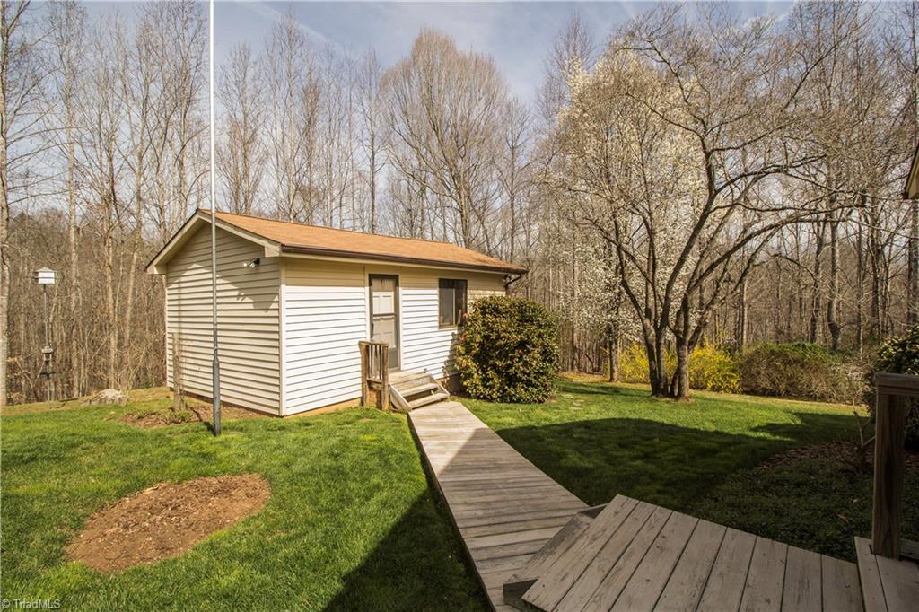 772 Bescher Chapel Road Trinity, NC 27370 - Photo 21 of 29 Wired workshop has a propane wall heater and a window A/C unit.