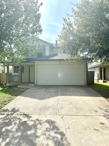 a view of a back yard of the house