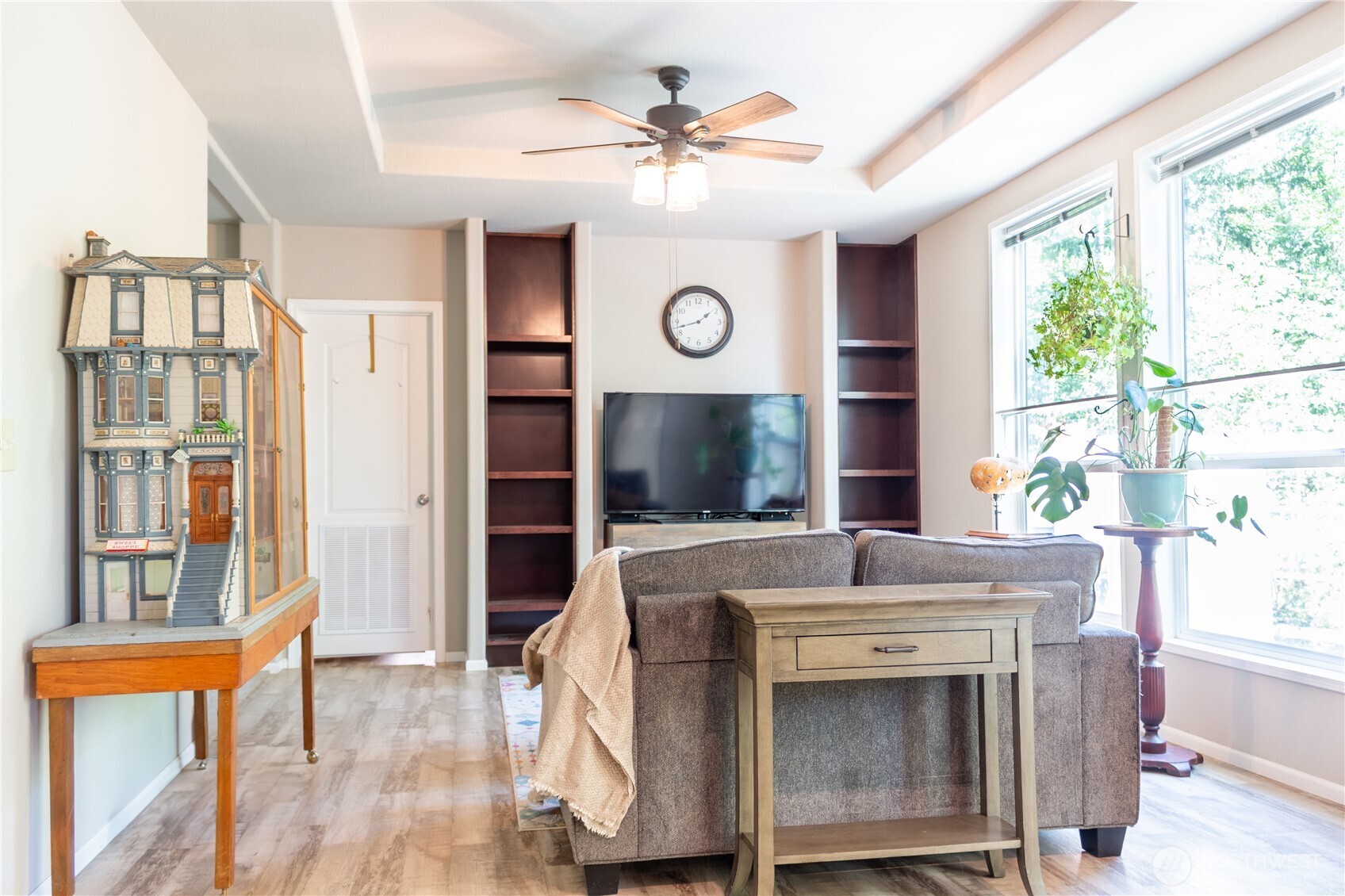 3111 East Rasor Road Belfair, WA 98528 - Photo 11 of 26 a view of living room kitchen with a large window and chandelier