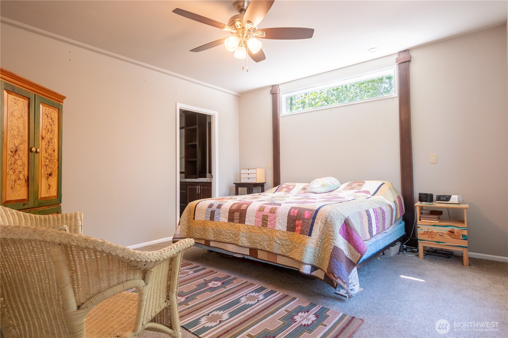 3111 East Rasor Road Belfair, WA 98528 - Photo 12 of 26 a bedroom with a bed and window