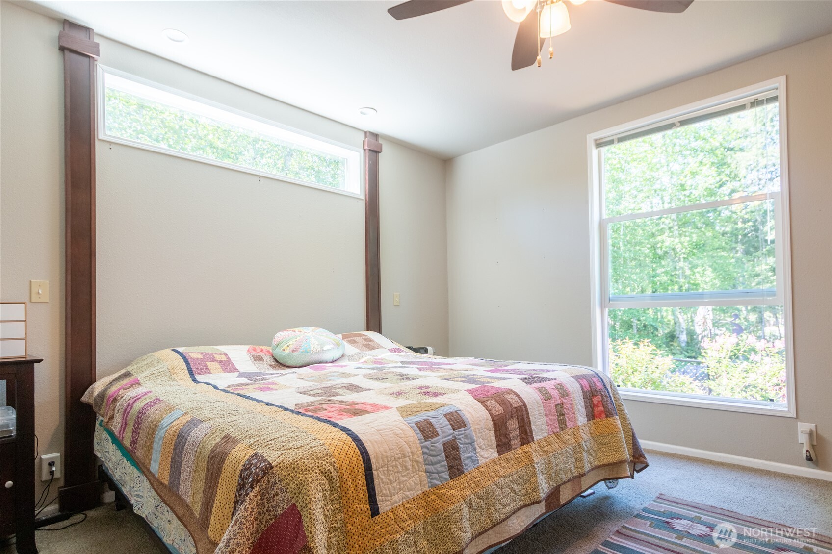 3111 East Rasor Road Belfair, WA 98528 - Photo 13 of 26 a bedroom with a bed and a window