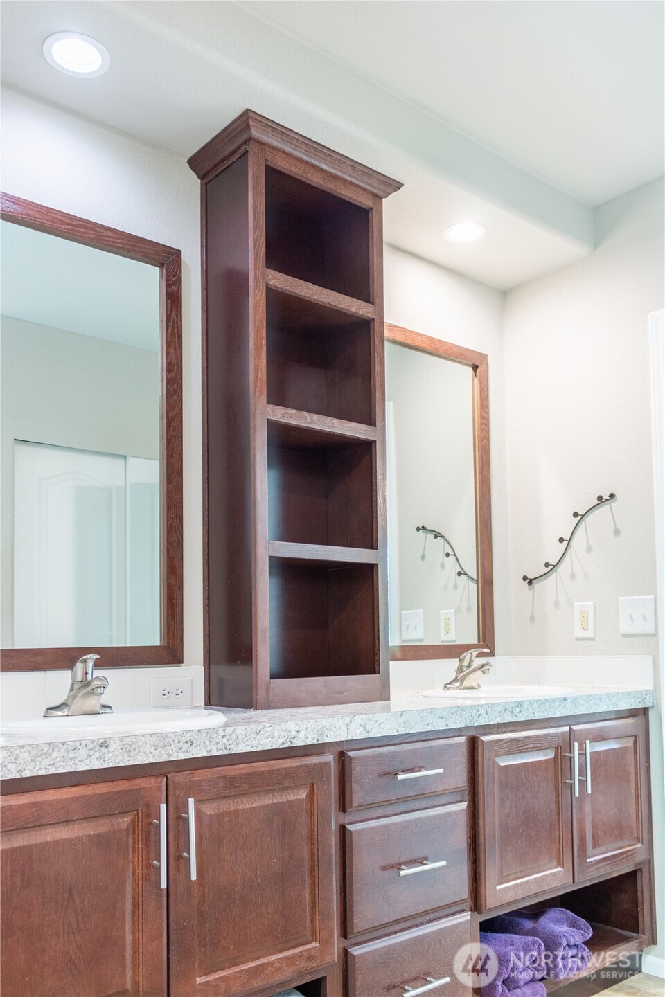3111 East Rasor Road Belfair, WA 98528 - Photo 15 of 26 a bathroom with a granite countertop sink and a mirror