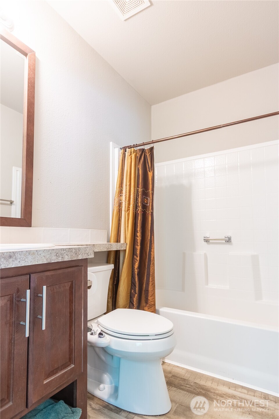 3111 East Rasor Road Belfair, WA 98528 - Photo 19 of 26 a bathroom with a sink a toilet and a bathtub
