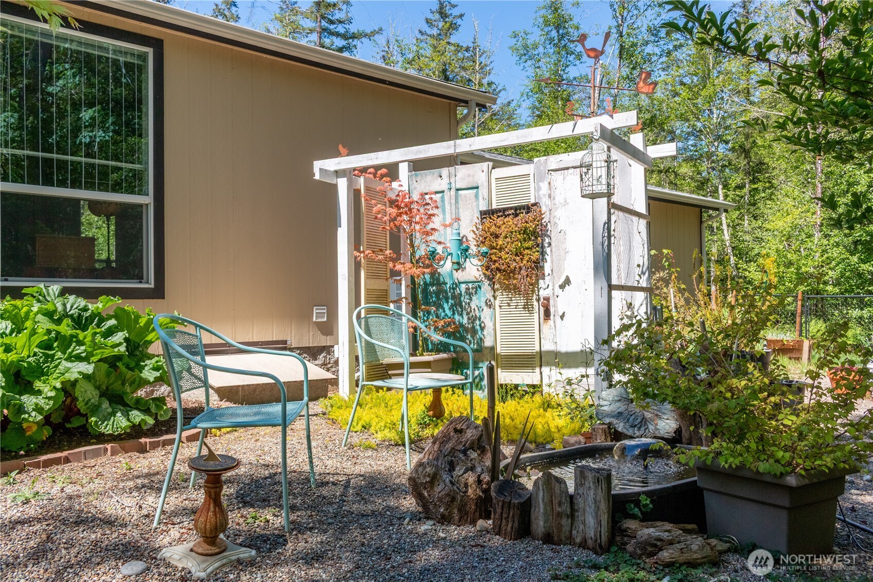 3111 East Rasor Road Belfair, WA 98528 - Photo 24 of 26 a view of a swimming pool with a patio