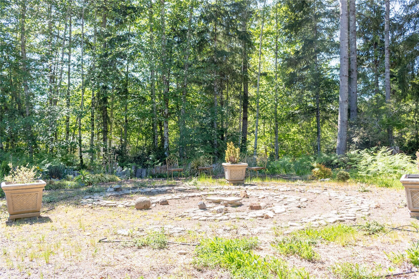 3111 East Rasor Road Belfair, WA 98528 - Photo 25 of 26 a view of a outdoor space with a patio and backyard