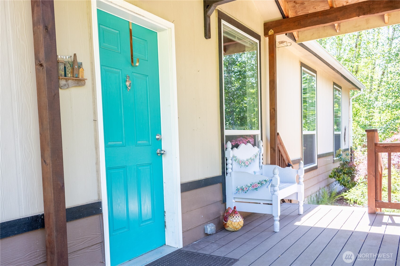 3111 East Rasor Road Belfair, WA 98528 - Photo 3 of 26 a view of front door and porch