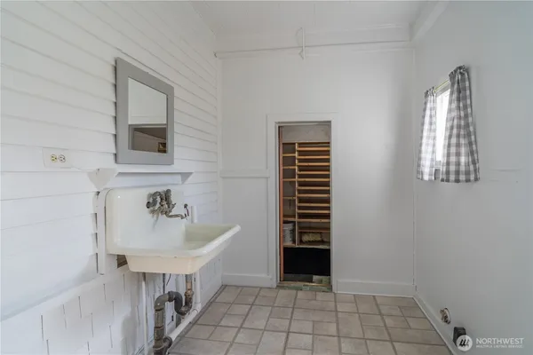 a bathroom with a sink toilet and tub