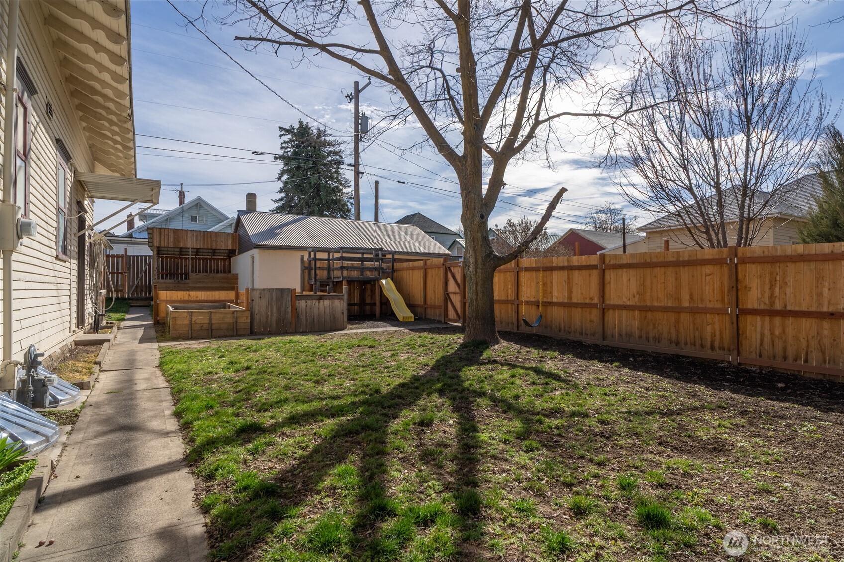 105 West 5th Avenue Ritzville, WA 99169 - Photo 29 of 40 a view of a backyard with a tree