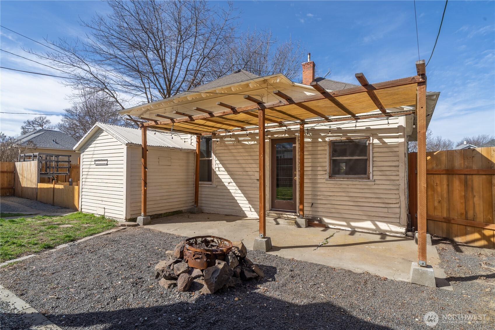105 West 5th Avenue Ritzville, WA 99169 - Photo 33 of 40 a view of a wooden house with a patio