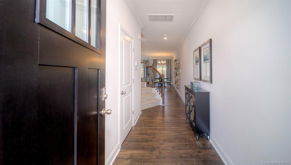 313 Bulrush Rd Lake Lake Wylie, SC 29710 - Photo 2 of 39 a view of a hallway with a wooden floors