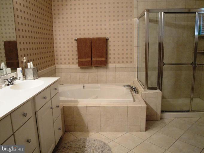 8517 Snowreath Road, Unit 8517 Pikesville, MD 21208 - Photo 15 of 27 Master Bath