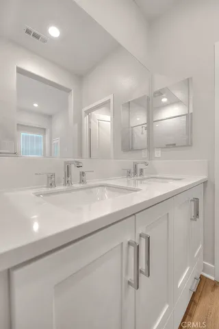 an empty room with a empty space and windows