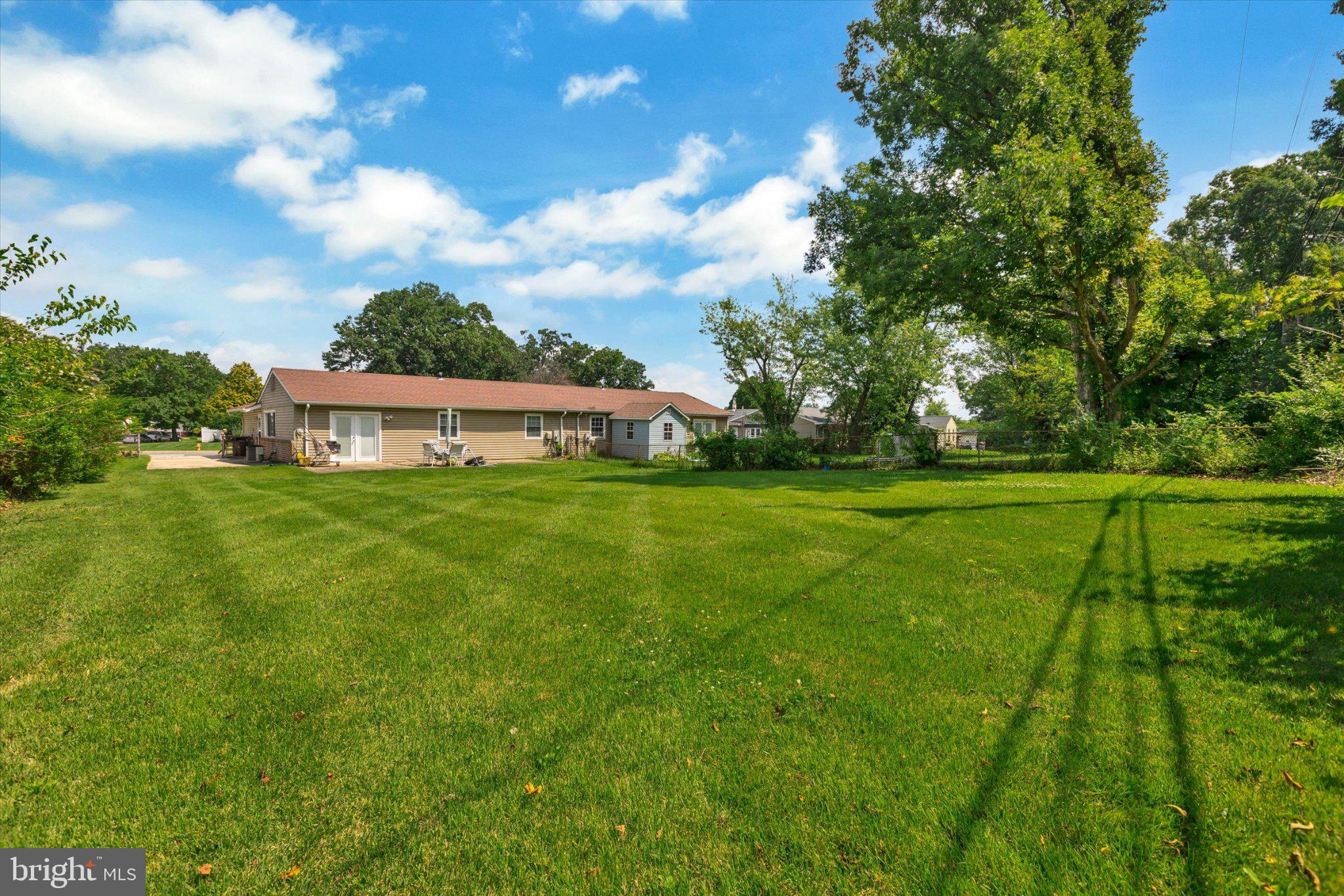 7167 Fairbrook Road Windsor Mill, MD 21244 - Photo 2 of 34 Spacious lawn with serene surroundings.