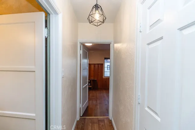 a view of stairs and with living room
