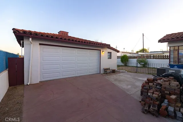 a house view with a backyard space