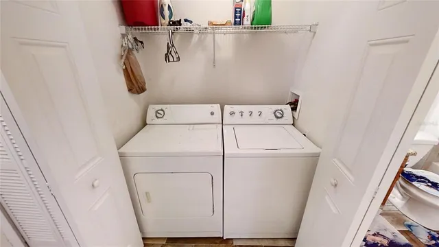 a utility room with dryer and washer