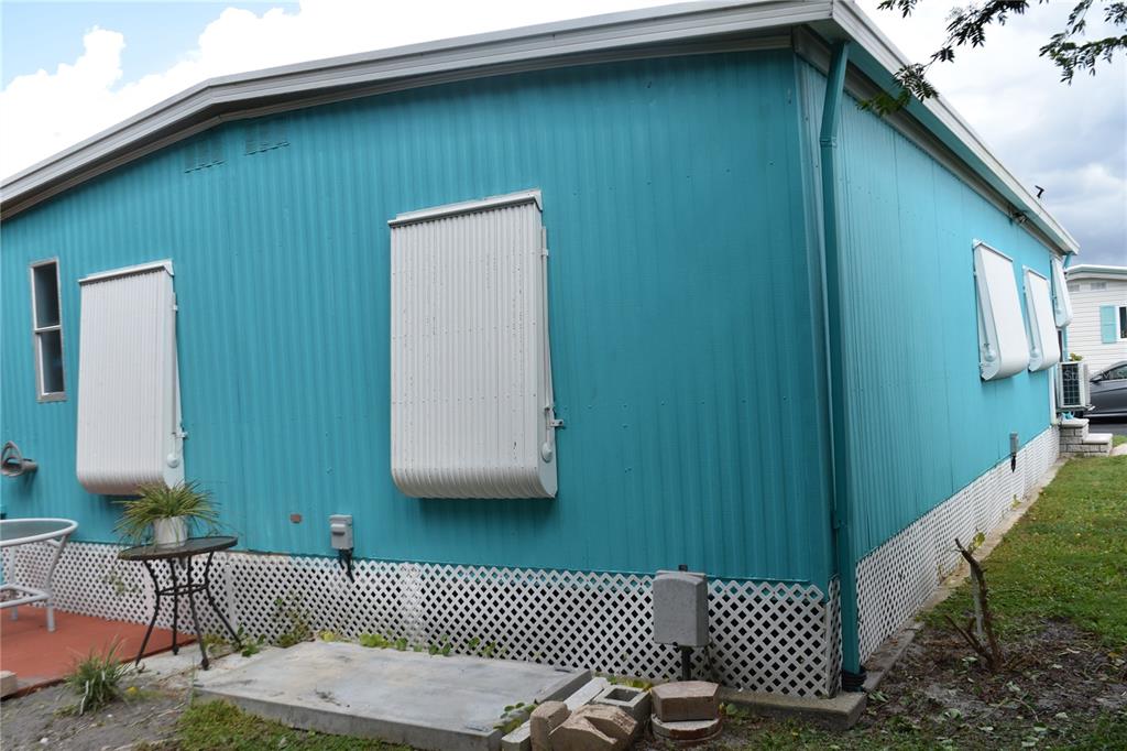4407 Tucker Square New Port Richey, FL 34652 - Photo 16 of 69 a front view of a house with a yard