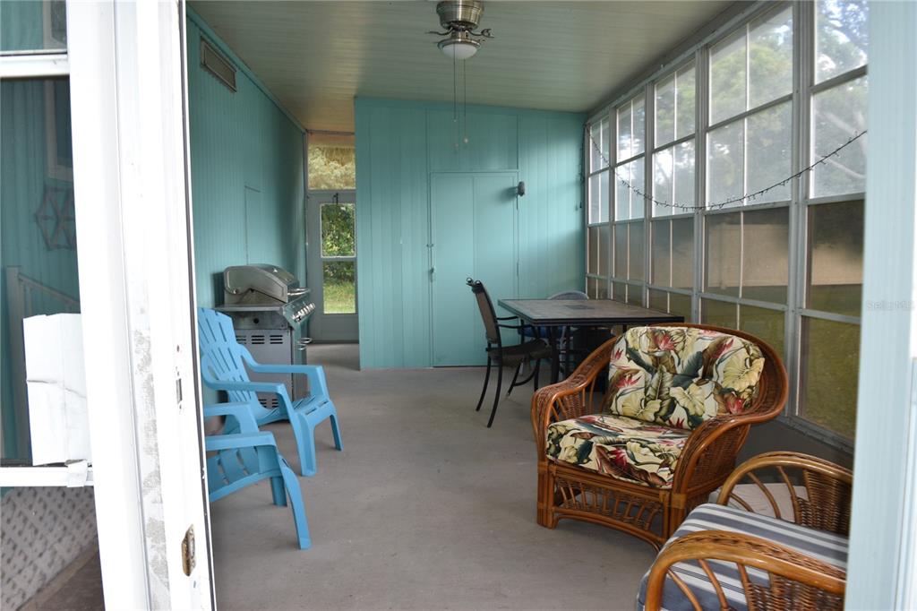 4407 Tucker Square New Port Richey, FL 34652 - Photo 22 of 69 a bedroom with furniture and a window