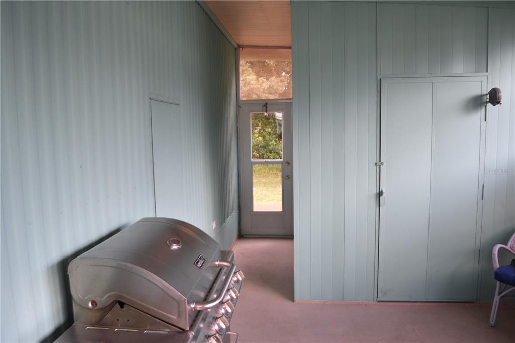 4407 Tucker Square New Port Richey, FL 34652 - Photo 23 of 69 a living room with a bed and a window