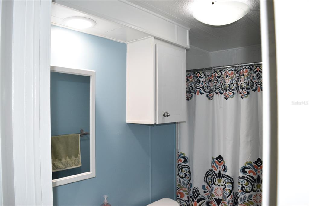 4407 Tucker Square New Port Richey, FL 34652 - Photo 46 of 69 a bathroom with a shower and a sink