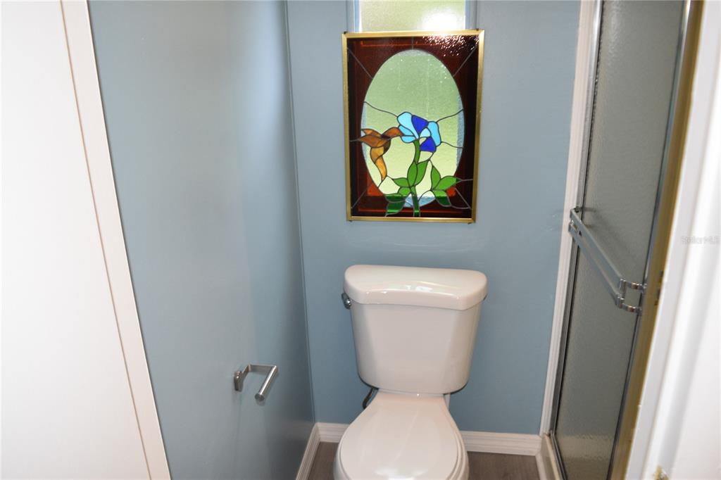 4407 Tucker Square New Port Richey, FL 34652 - Photo 63 of 69 a bathroom with a toilet and a sink