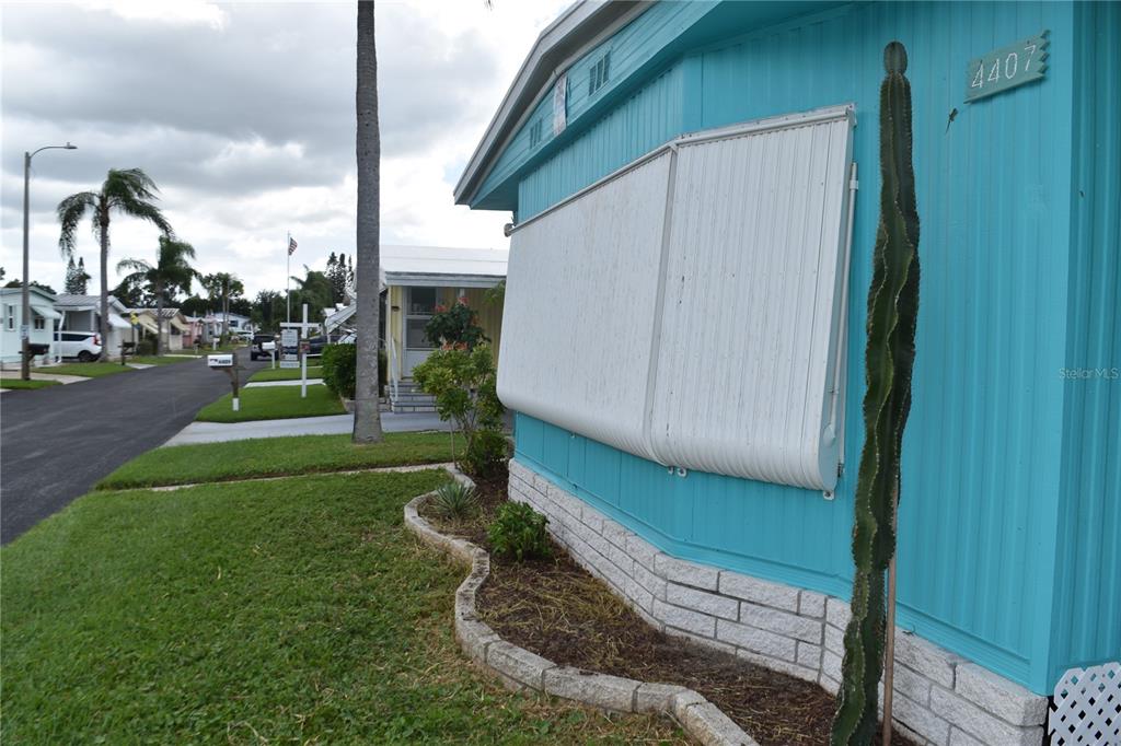 4407 Tucker Square New Port Richey, FL 34652 - Photo 9 of 69 a view of a back yard of the house
