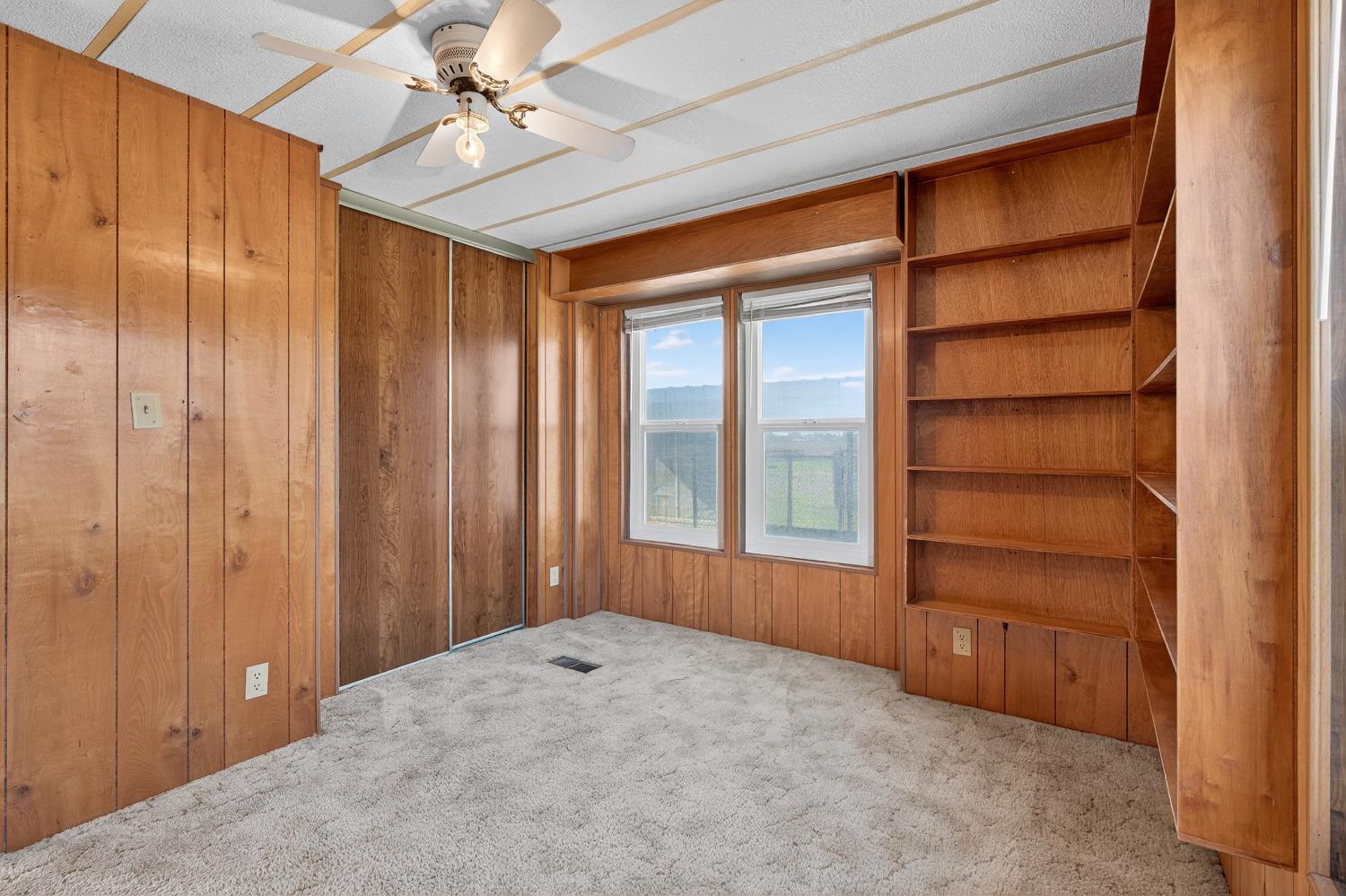 11900 Brandt Road Lockeford, CA 95237 - Photo 27 of 49 a view of an empty room with a window