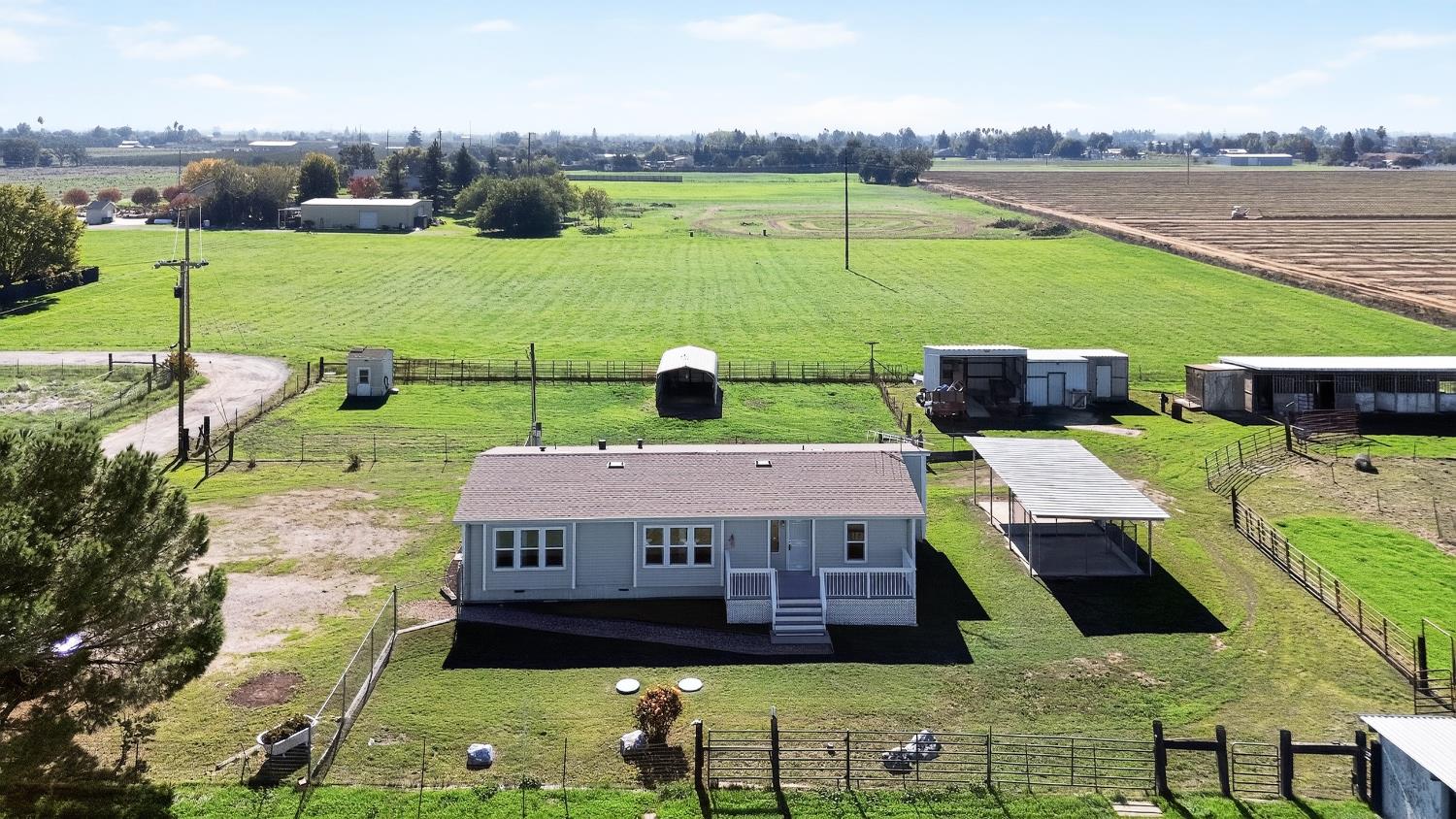 11900 Brandt Road Lockeford, CA 95237 - Photo 35 of 49 a view of a house with a big yard