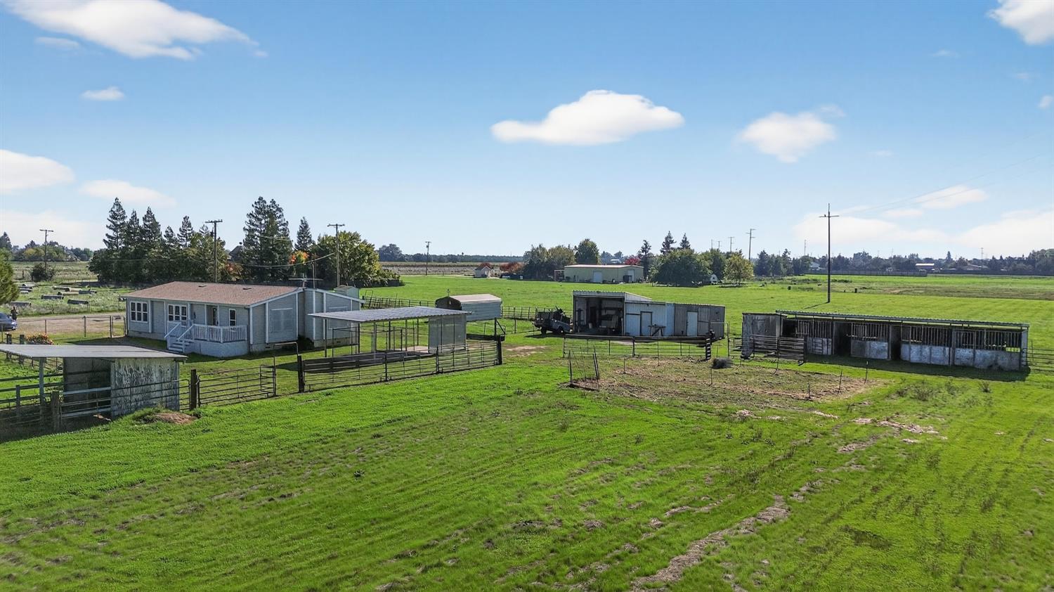 11900 Brandt Road Lockeford, CA 95237 - Photo 43 of 49 a view of an house with backyard space and sitting area