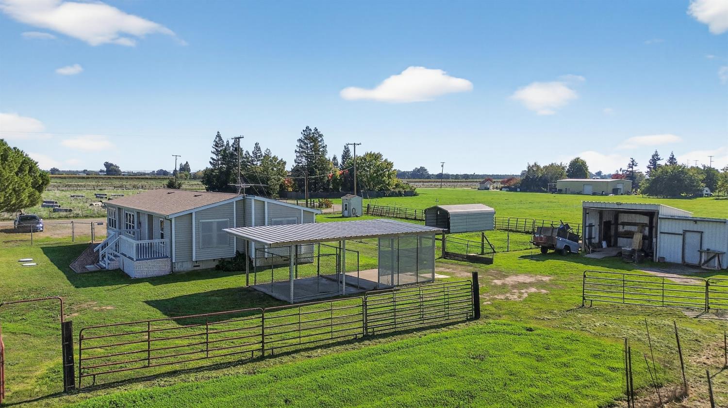 11900 Brandt Road Lockeford, CA 95237 - Photo 44 of 49 a view of a house with a big yard