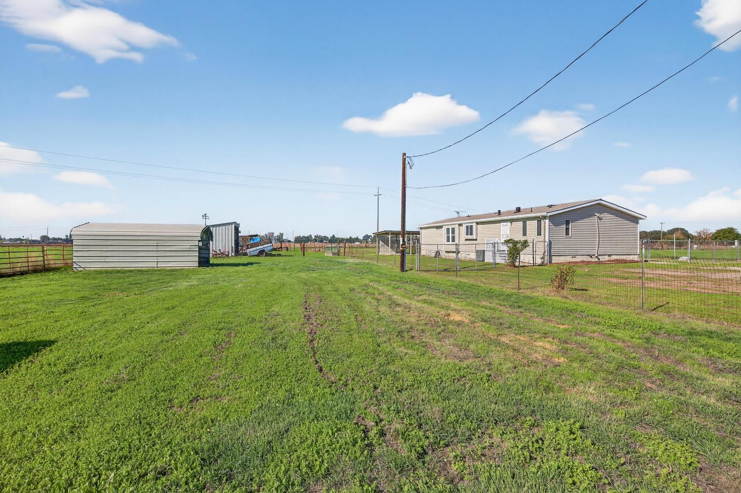 11900 Brandt Road Lockeford, CA 95237 - Photo 6 of 49 a big room with yard