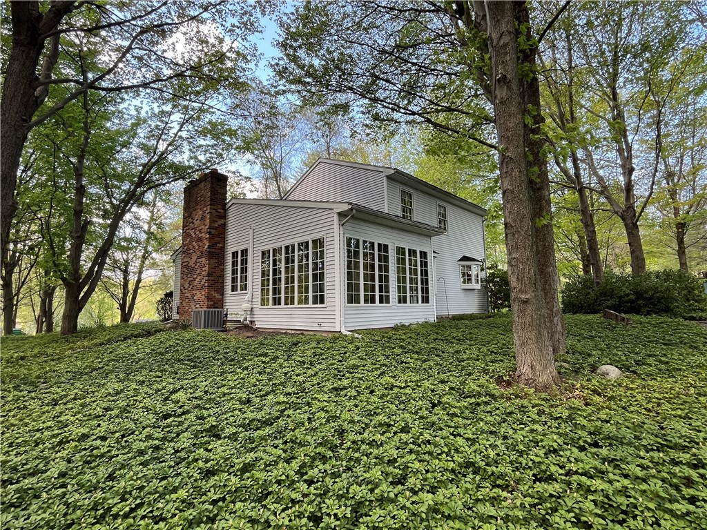 7770 West Port Bay Road Wolcott, NY 14590 - Photo 1 of 1 Nestled in the woods is this beautiful WELL-BUILT home w/680' of waterfrontage