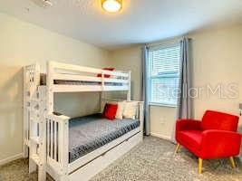 707 Ocean Course Avenue Davenport, FL 33896 - Photo 21 of 31 a living room with furniture