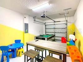 707 Ocean Course Avenue Davenport, FL 33896 - Photo 27 of 31 a view of an outdoor space with seating