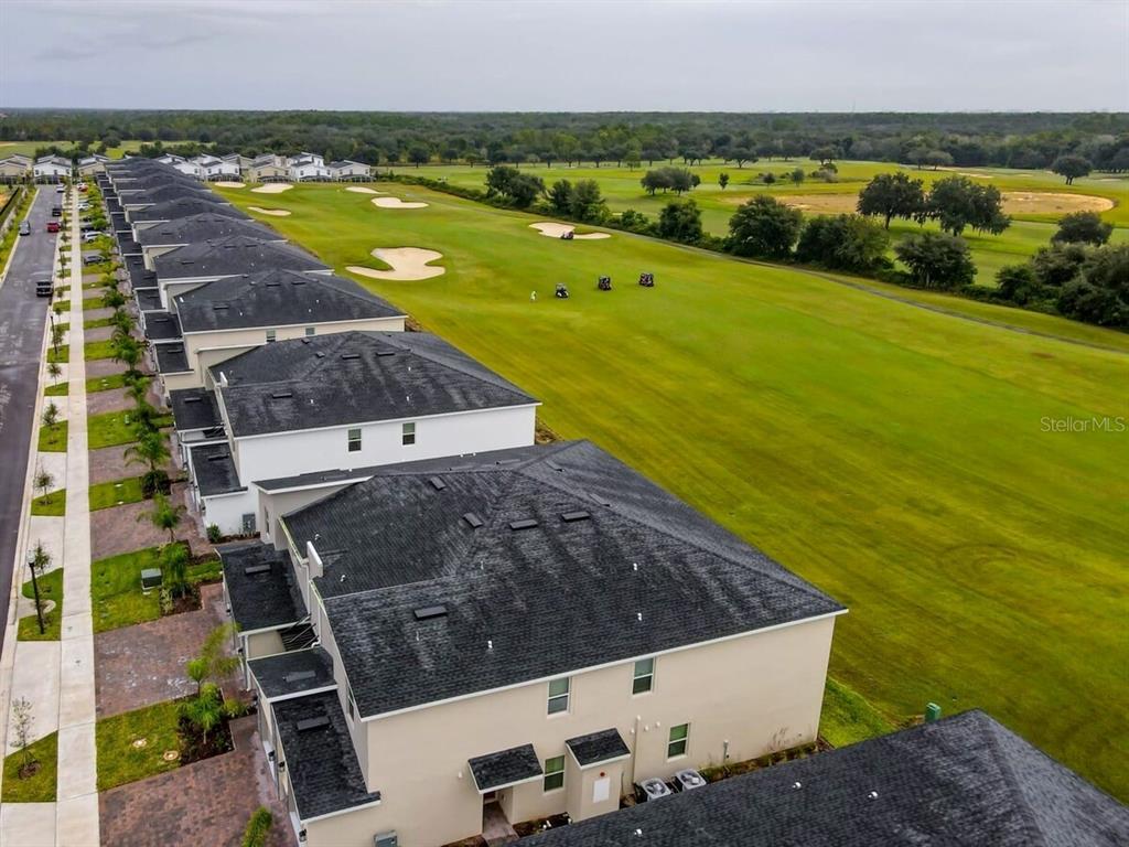 707 Ocean Course Avenue Davenport, FL 33896 - Photo 29 of 31 swimming pool with an ocean view