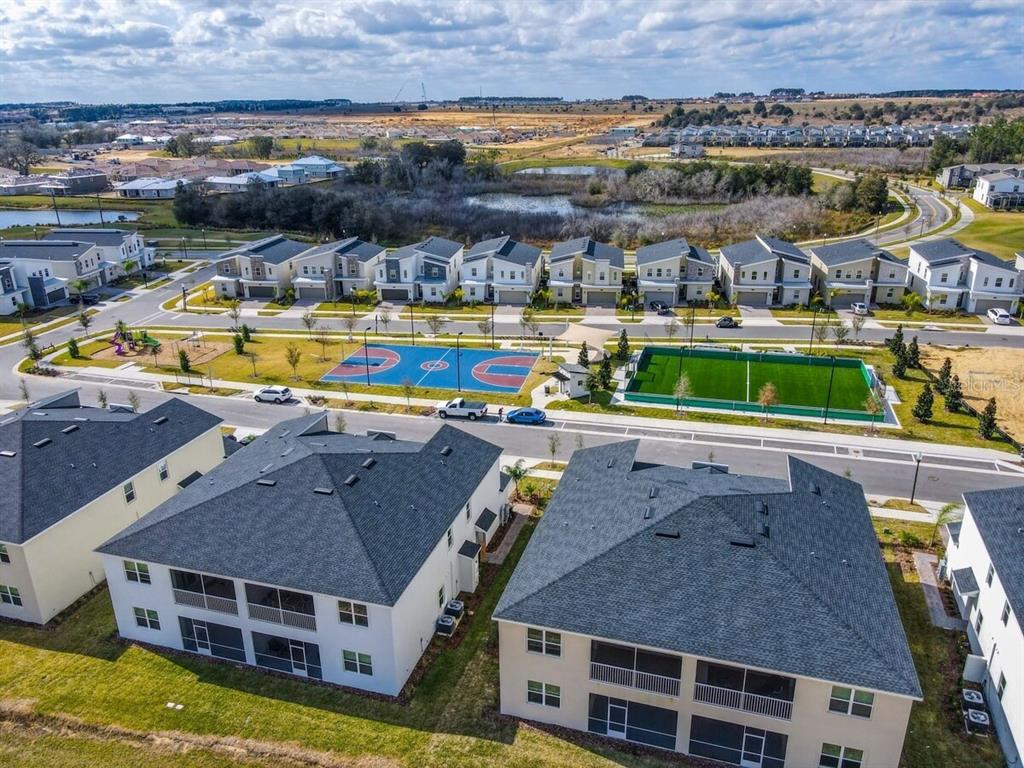 707 Ocean Course Avenue Davenport, FL 33896 - Photo 31 of 31 an aerial view of a house with a swimming pool yard and outdoor seating