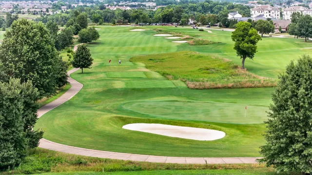a view of a golf course with a garden