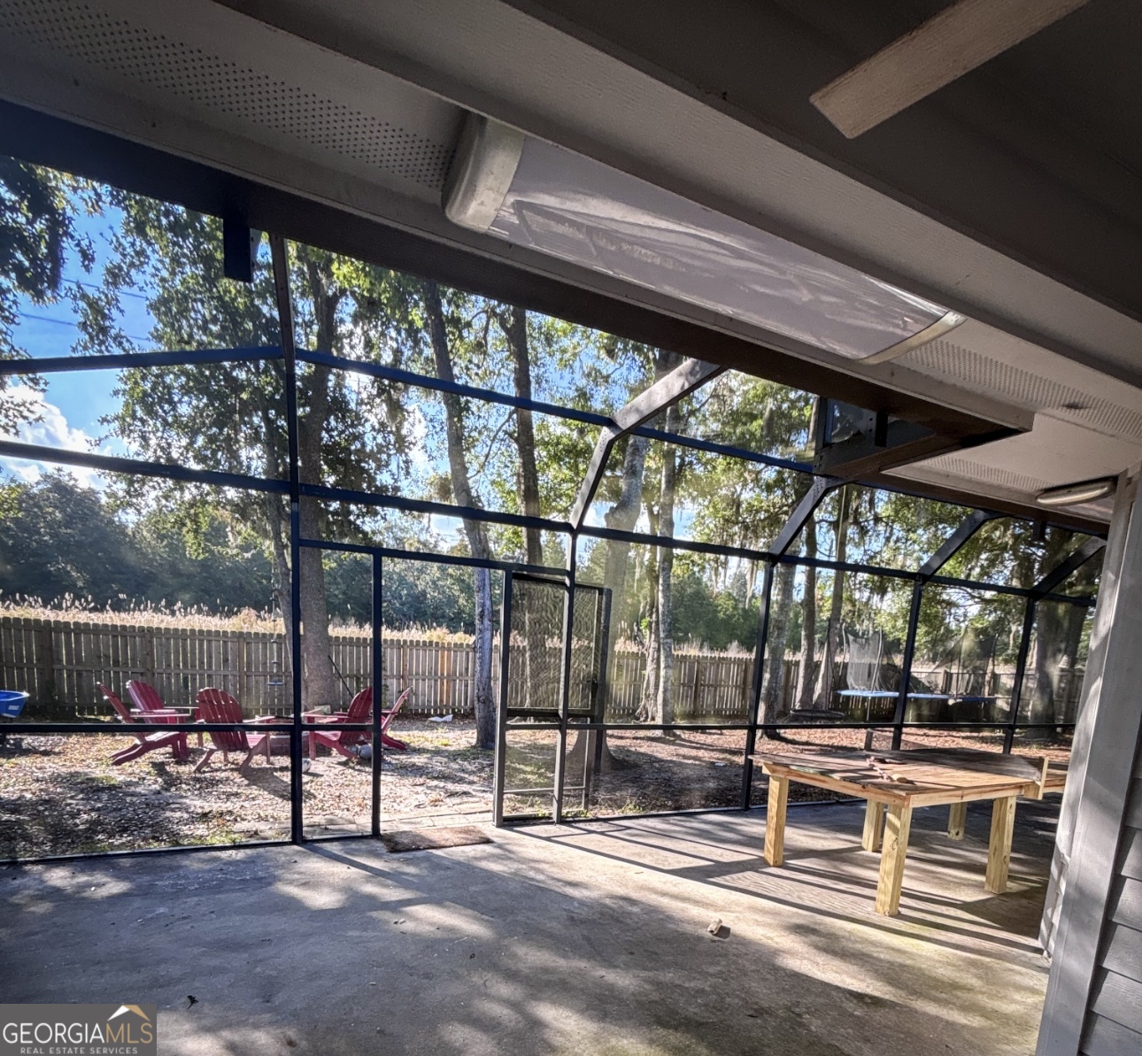 102 Honeysuckle Road Kingsland, GA 31548 - Photo 15 of 17 a outdoor space with lots of tables and chairs