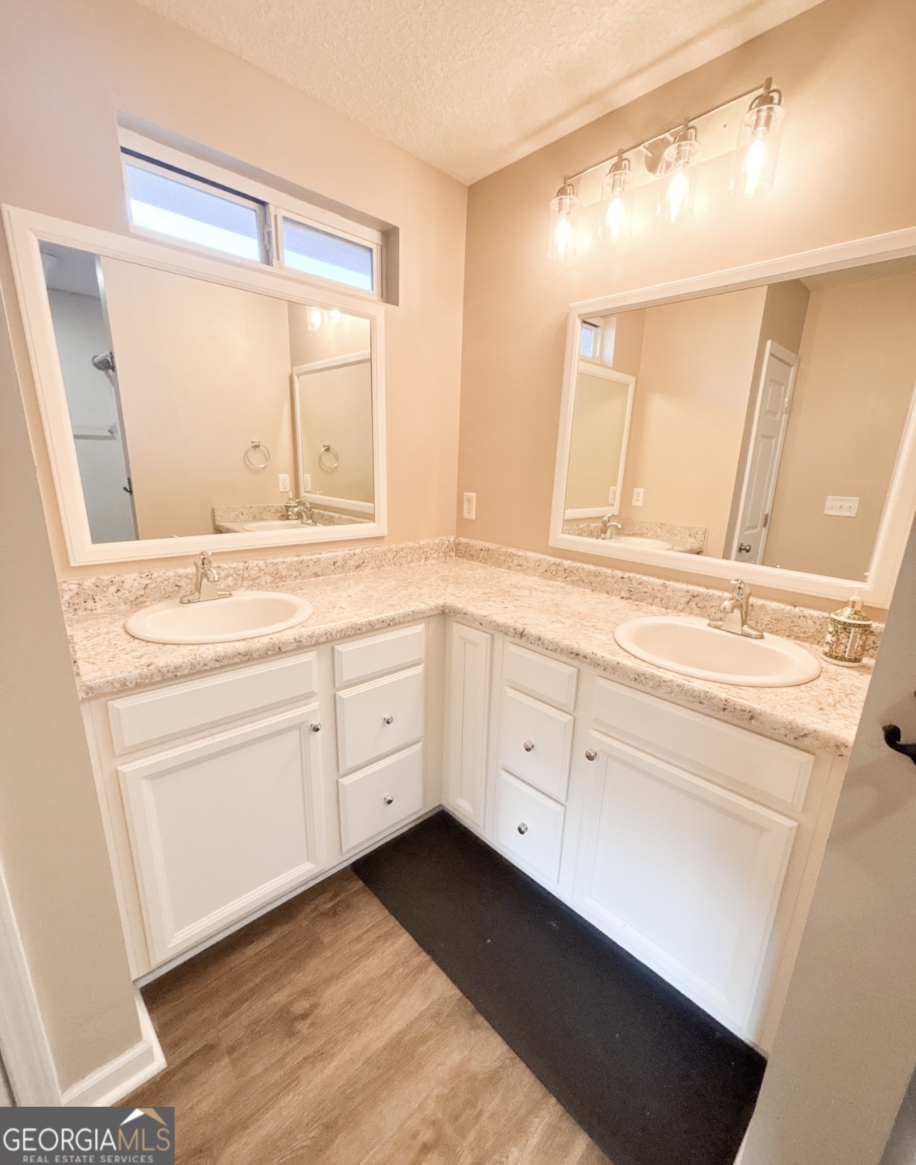 102 Honeysuckle Road Kingsland, GA 31548 - Photo 9 of 17 a white bath tub sitting in a bathroom