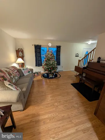 a bed room with a bed and a chair