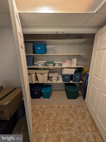 a room with furniture and a flat screen tv