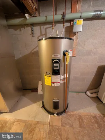 a bathroom with a granite countertop window and a shower