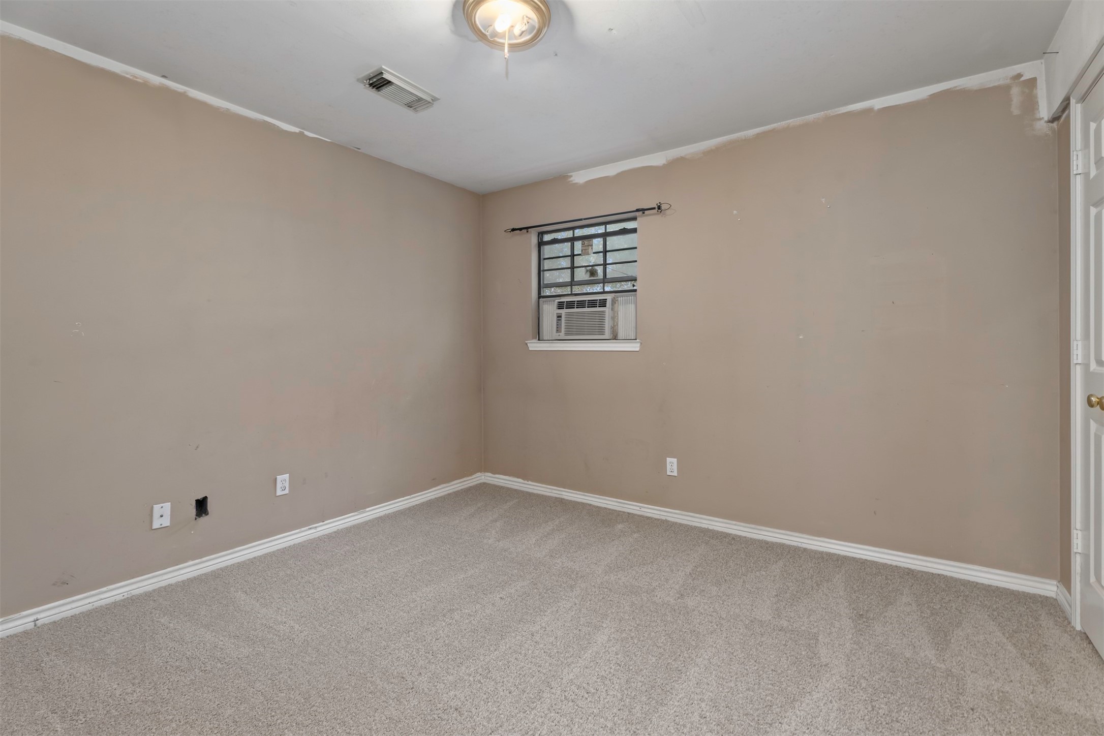 2322 Shadow Glen Lane Spring, TX 77386 - Photo 41 of 48 One of two secondary bedrooms located on the main level in the smaller house.