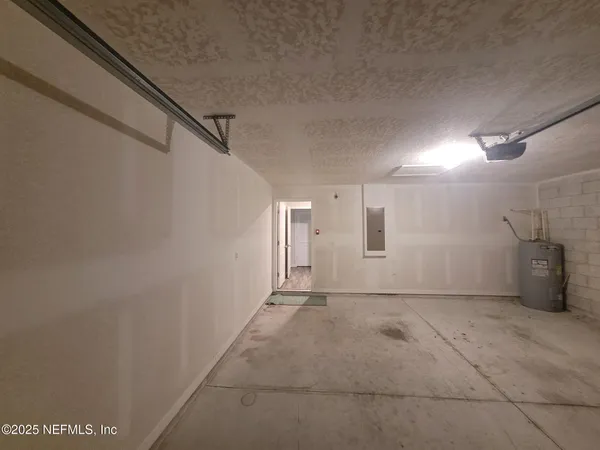 a view of kitchen and wooden floor