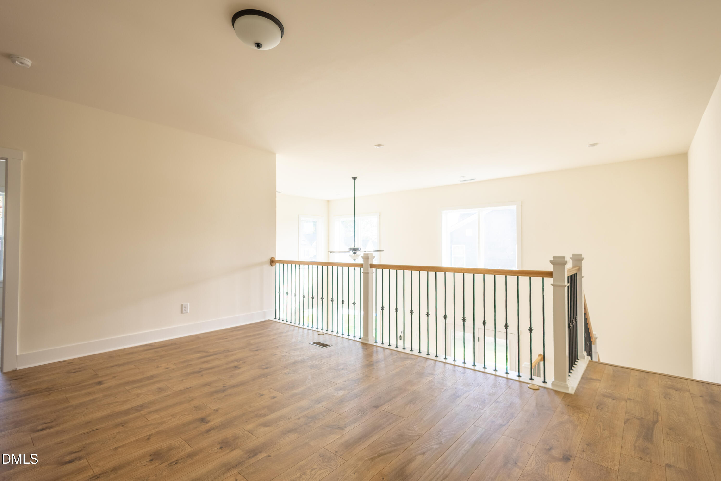 2001 Skipping Stone Drive Durham, NC 27705 - Photo 20 of 44 a view of a room with wooden floor