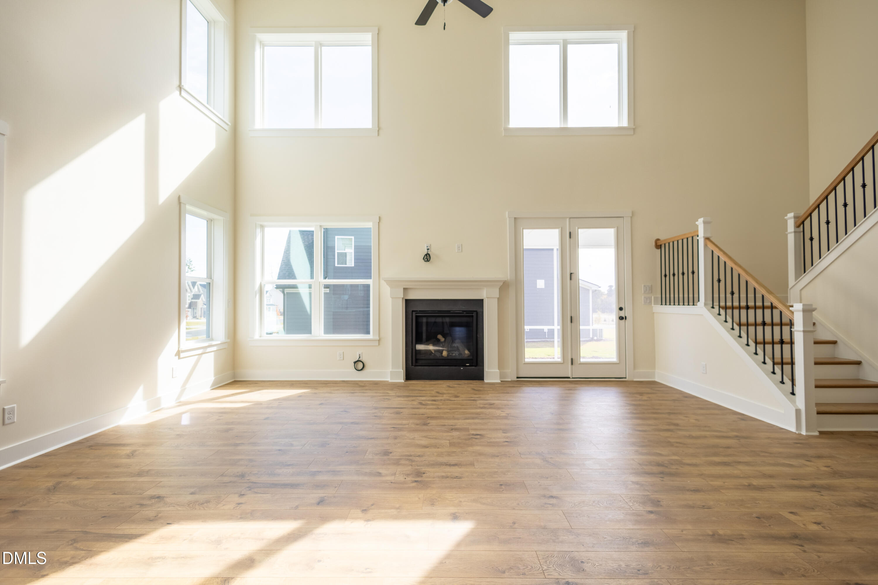 2001 Skipping Stone Drive Durham, NC 27705 - Photo 26 of 44 a view of an empty room with wooden floor and a window