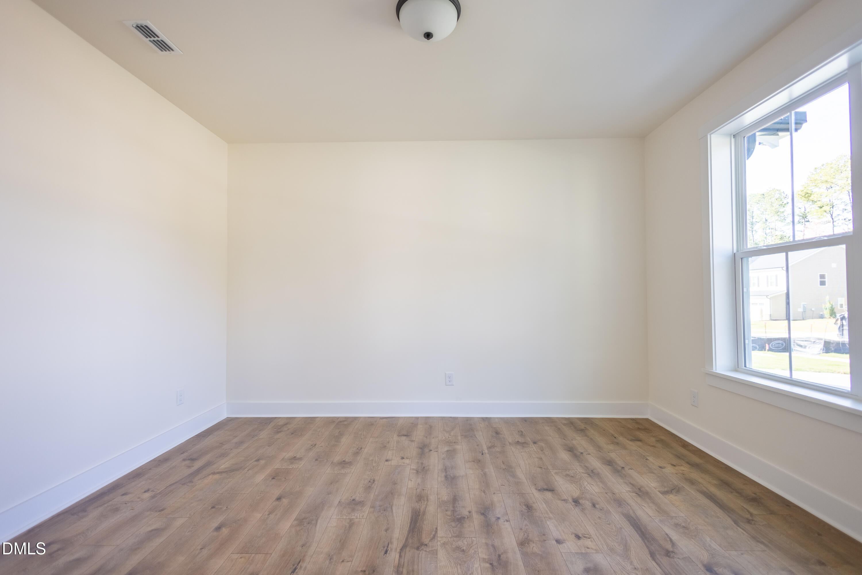 2001 Skipping Stone Drive Durham, NC 27705 - Photo 33 of 44 an empty room with a window