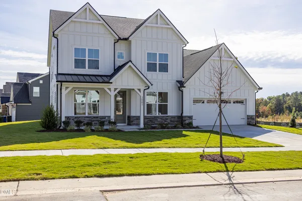 a view of a house with a big yard