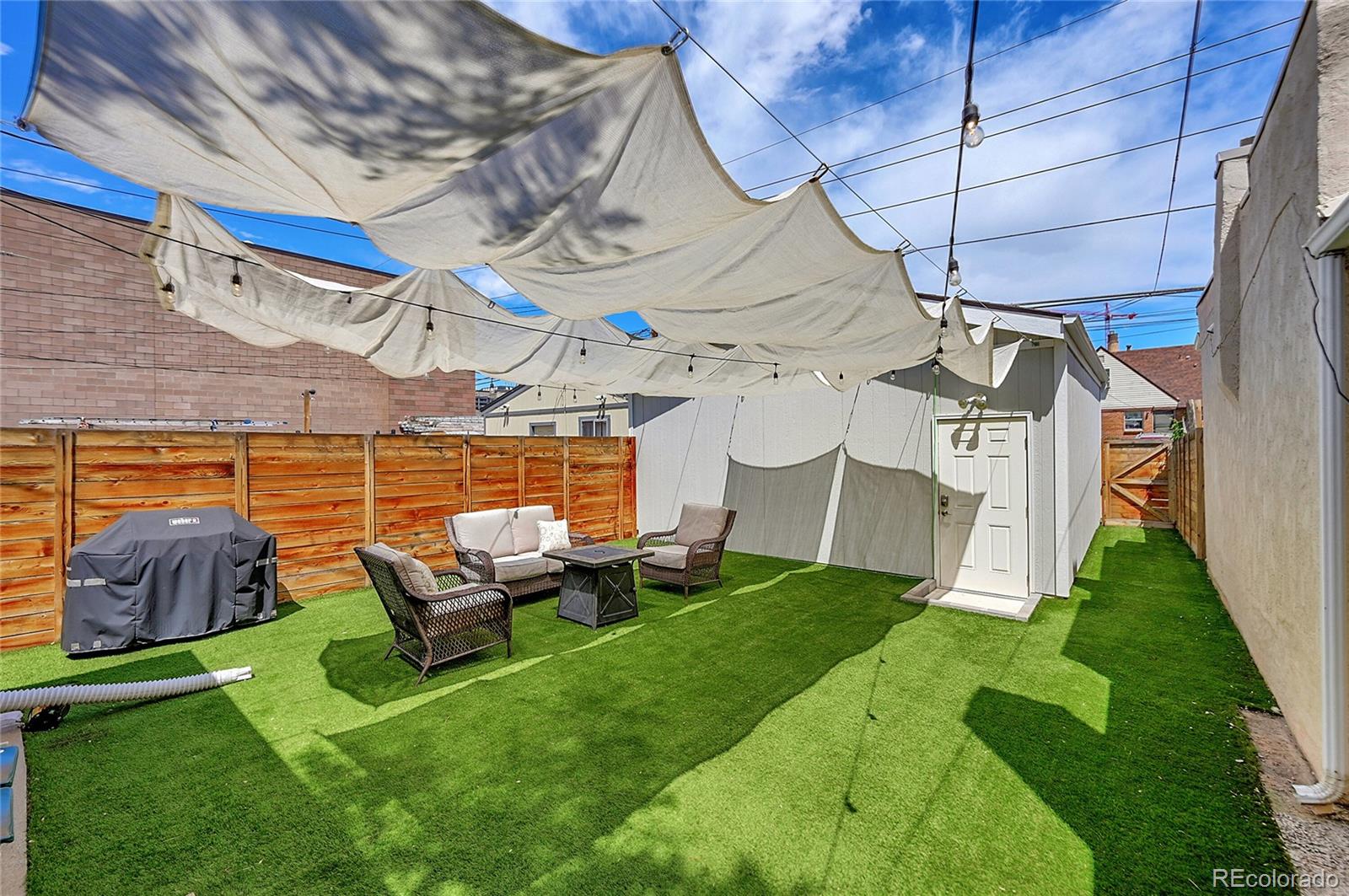 944 Inca Street Denver, CO 80204 - Photo 2 of 29 a garden view with a seating space